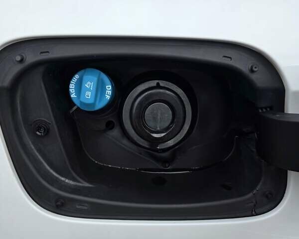 Білий Опель Інсігнія, об'ємом двигуна 2 л та пробігом 225 тис. км за 16500 $, фото 41 на Automoto.ua