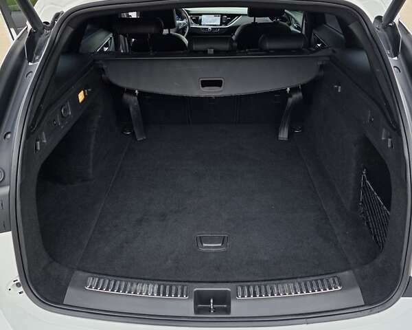 Білий Опель Інсігнія, об'ємом двигуна 2 л та пробігом 225 тис. км за 16500 $, фото 37 на Automoto.ua