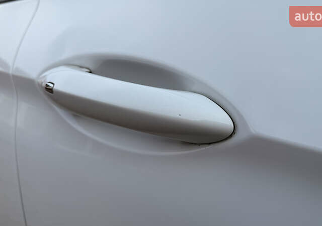 Белый Опель Инсигния, объемом двигателя 1.96 л и пробегом 149 тыс. км за 15900 $, фото 18 на Automoto.ua