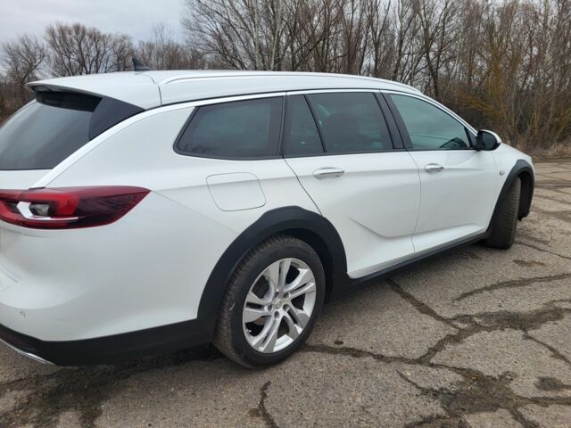 Білий Опель Інсігнія, об'ємом двигуна 2 л та пробігом 230 тис. км за 15400 $, фото 2 на Automoto.ua