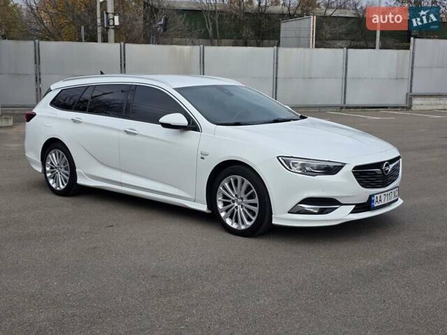 Білий Опель Інсігнія, об'ємом двигуна 2 л та пробігом 225 тис. км за 16500 $, фото 2 на Automoto.ua