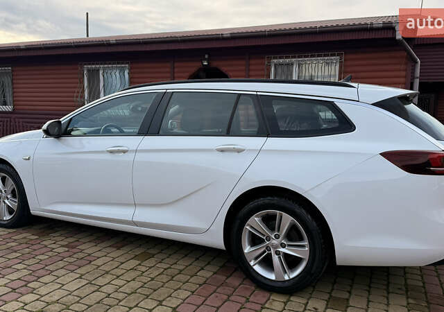 Белый Опель Инсигния, объемом двигателя 1.96 л и пробегом 149 тыс. км за 15900 $, фото 14 на Automoto.ua