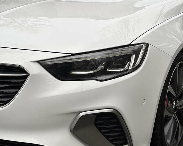 Білий Опель Інсігнія, об'ємом двигуна 1.96 л та пробігом 209 тис. км за 22000 $, фото 6 на Automoto.ua