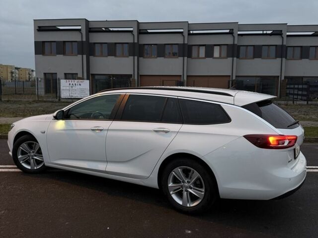 Білий Опель Інсігнія, об'ємом двигуна 2 л та пробігом 178 тис. км за 13000 $, фото 2 на Automoto.ua