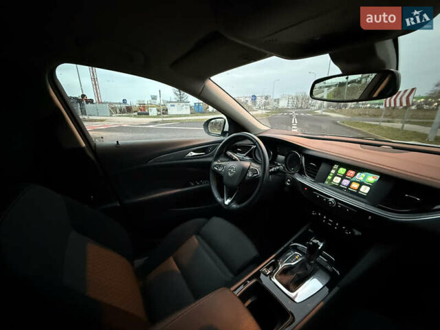 Белый Опель Инсигния, объемом двигателя 2 л и пробегом 178 тыс. км за 14000 $, фото 11 на Automoto.ua