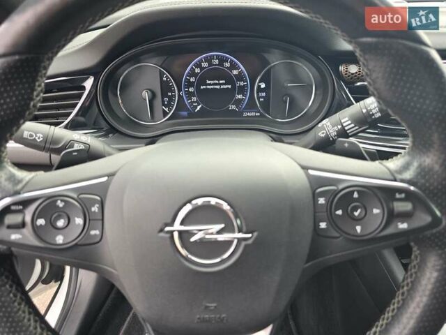 Білий Опель Інсігнія, об'ємом двигуна 2 л та пробігом 225 тис. км за 16500 $, фото 24 на Automoto.ua