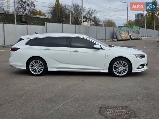 Білий Опель Інсігнія, об'ємом двигуна 2 л та пробігом 225 тис. км за 16500 $, фото 3 на Automoto.ua