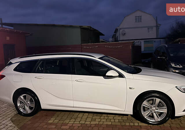 Білий Опель Інсігнія, об'ємом двигуна 1.96 л та пробігом 149 тис. км за 15500 $, фото 1 на Automoto.ua