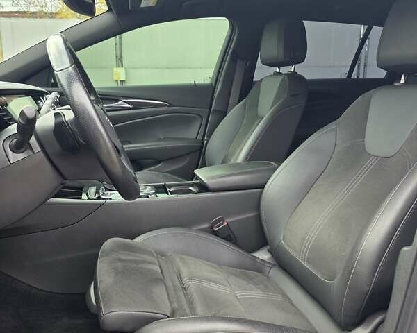 Білий Опель Інсігнія, об'ємом двигуна 2 л та пробігом 225 тис. км за 16500 $, фото 30 на Automoto.ua