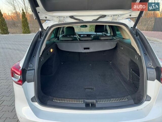 Белый Опель Инсигния, объемом двигателя 2 л и пробегом 223 тыс. км за 16100 $, фото 19 на Automoto.ua