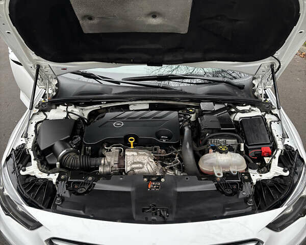 Білий Опель Інсігнія, об'ємом двигуна 1.96 л та пробігом 209 тис. км за 22000 $, фото 16 на Automoto.ua