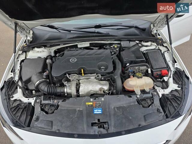 Білий Опель Інсігнія, об'ємом двигуна 2 л та пробігом 225 тис. км за 16500 $, фото 49 на Automoto.ua