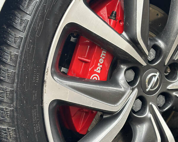 Білий Опель Інсігнія, об'ємом двигуна 1.96 л та пробігом 209 тис. км за 22000 $, фото 8 на Automoto.ua