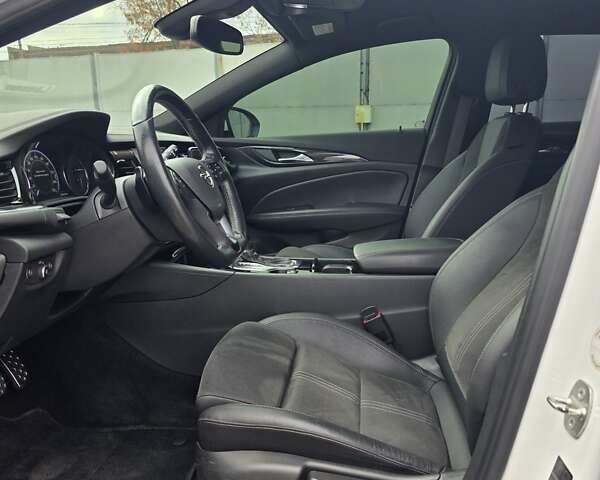 Білий Опель Інсігнія, об'ємом двигуна 2 л та пробігом 225 тис. км за 16500 $, фото 29 на Automoto.ua