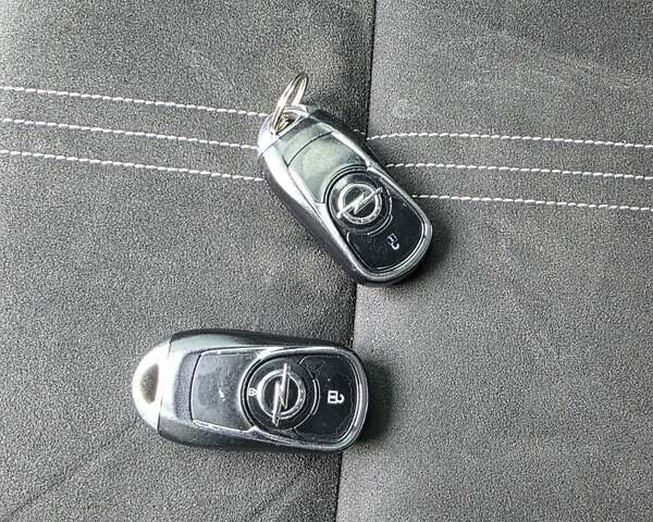 Білий Опель Інсігнія, об'ємом двигуна 2 л та пробігом 225 тис. км за 16500 $, фото 50 на Automoto.ua