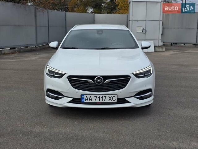 Білий Опель Інсігнія, об'ємом двигуна 2 л та пробігом 225 тис. км за 16500 $, фото 10 на Automoto.ua