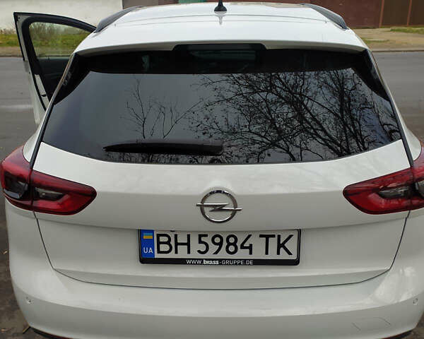 Білий Опель Інсігнія, об'ємом двигуна 1.6 л та пробігом 143 тис. км за 18900 $, фото 1 на Automoto.ua