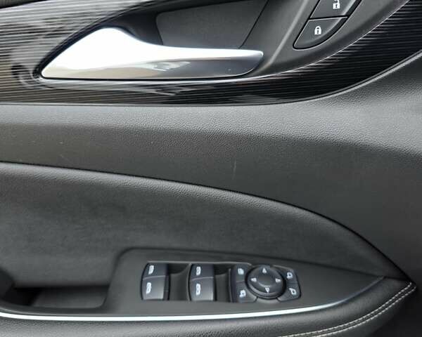 Білий Опель Інсігнія, об'ємом двигуна 2 л та пробігом 225 тис. км за 16500 $, фото 26 на Automoto.ua