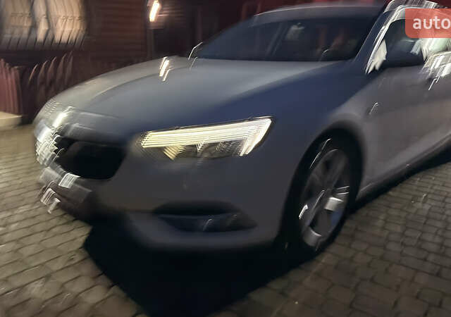 Білий Опель Інсігнія, об'ємом двигуна 1.96 л та пробігом 149 тис. км за 15500 $, фото 7 на Automoto.ua