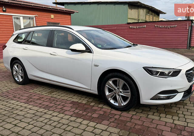 Белый Опель Инсигния, объемом двигателя 1.96 л и пробегом 149 тыс. км за 15900 $, фото 5 на Automoto.ua