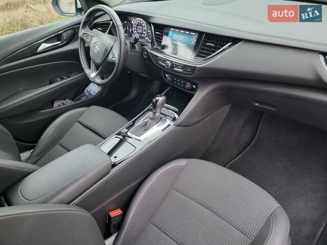 Белый Опель Инсигния, объемом двигателя 2 л и пробегом 231 тыс. км за 15500 $, фото 7 на Automoto.ua