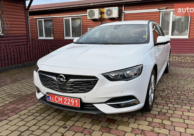 Белый Опель Инсигния, объемом двигателя 1.96 л и пробегом 149 тыс. км за 15900 $, фото 1 на Automoto.ua
