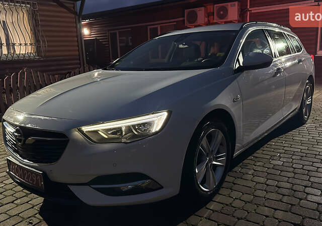 Білий Опель Інсігнія, об'ємом двигуна 1.96 л та пробігом 149 тис. км за 15500 $, фото 8 на Automoto.ua