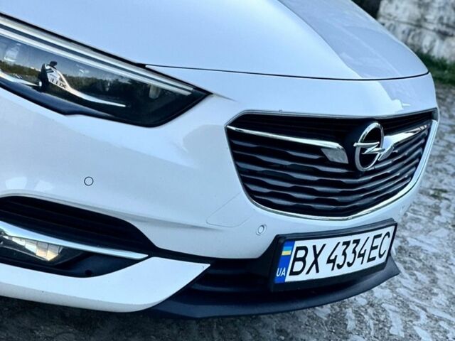 Білий Опель Інсігнія, об'ємом двигуна 1.6 л та пробігом 228 тис. км за 15800 $, фото 44 на Automoto.ua