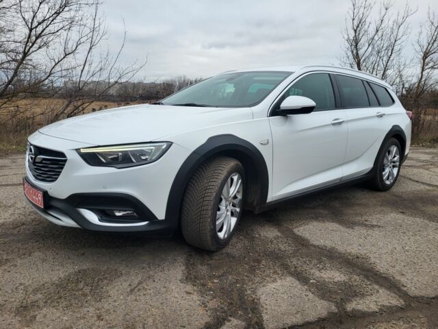 Білий Опель Інсігнія, об'ємом двигуна 2 л та пробігом 230 тис. км за 15400 $, фото 1 на Automoto.ua