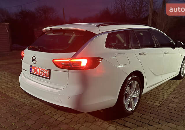 Білий Опель Інсігнія, об'ємом двигуна 1.96 л та пробігом 149 тис. км за 15500 $, фото 3 на Automoto.ua