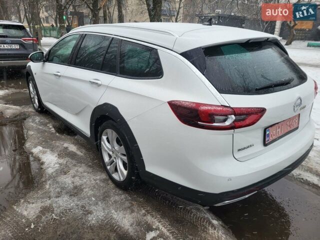 Білий Опель Інсігнія, об'ємом двигуна 2 л та пробігом 231 тис. км за 15000 $, фото 9 на Automoto.ua