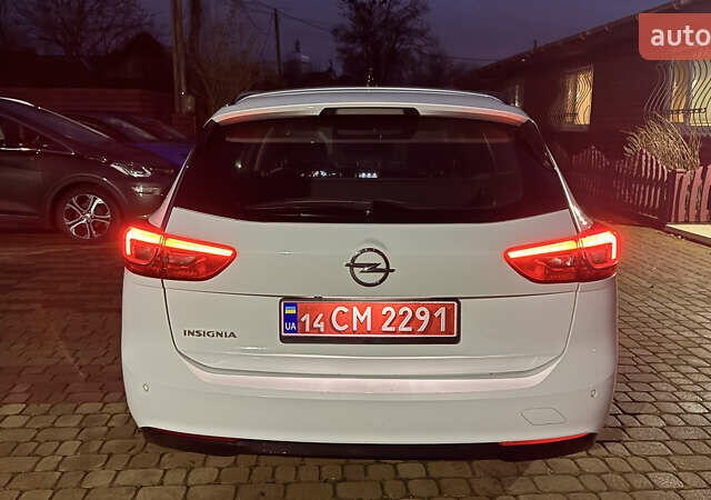 Білий Опель Інсігнія, об'ємом двигуна 1.96 л та пробігом 149 тис. км за 15500 $, фото 4 на Automoto.ua