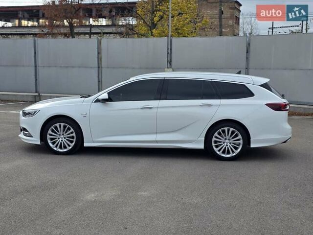 Білий Опель Інсігнія, об'ємом двигуна 2 л та пробігом 225 тис. км за 16500 $, фото 7 на Automoto.ua