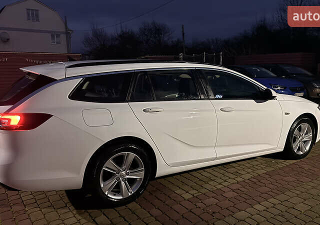 Білий Опель Інсігнія, об'ємом двигуна 1.96 л та пробігом 149 тис. км за 15500 $, фото 2 на Automoto.ua