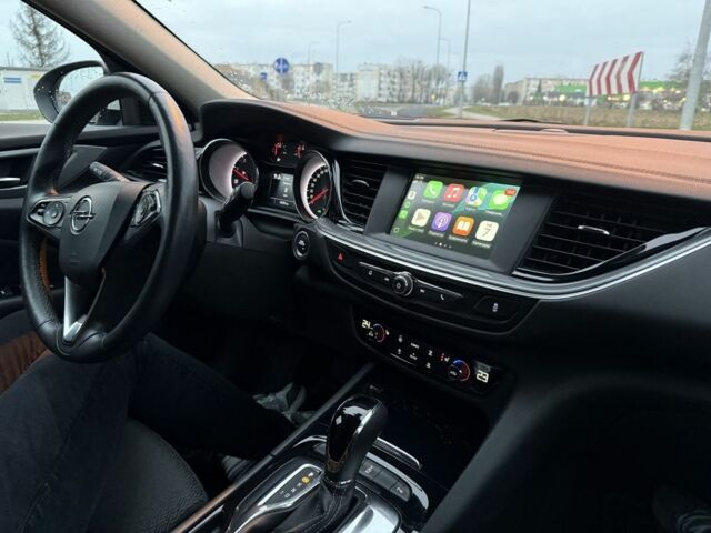 Білий Опель Інсігнія, об'ємом двигуна 2 л та пробігом 178 тис. км за 13000 $, фото 7 на Automoto.ua