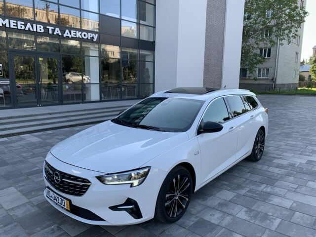 Белый Опель Инсигния, объемом двигателя 2 л и пробегом 189 тыс. км за 18600 $, фото 3 на Automoto.ua