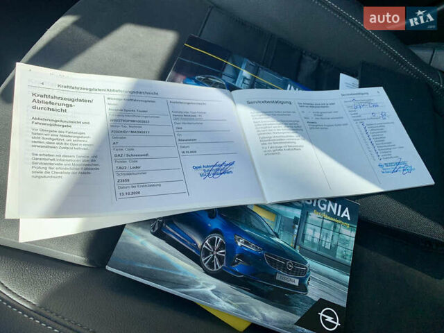 Білий Опель Інсігнія, об'ємом двигуна 2 л та пробігом 189 тис. км за 18950 $, фото 26 на Automoto.ua