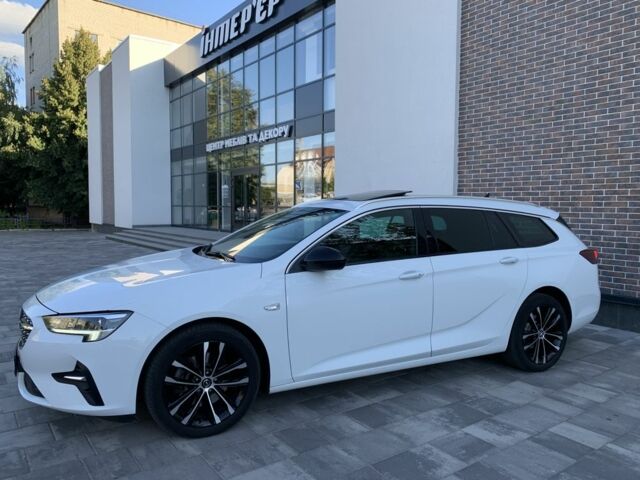 Белый Опель Инсигния, объемом двигателя 2 л и пробегом 189 тыс. км за 18600 $, фото 4 на Automoto.ua