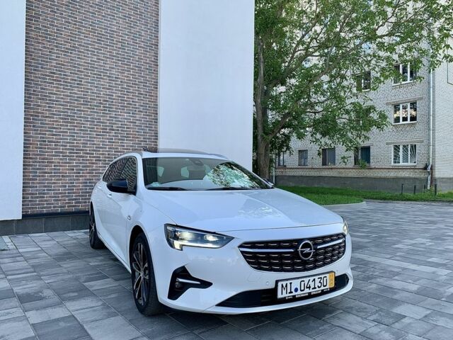Белый Опель Инсигния, объемом двигателя 2 л и пробегом 189 тыс. км за 18600 $, фото 1 на Automoto.ua