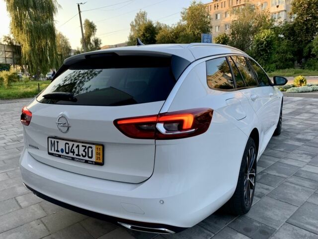 Белый Опель Инсигния, объемом двигателя 2 л и пробегом 189 тыс. км за 18600 $, фото 7 на Automoto.ua