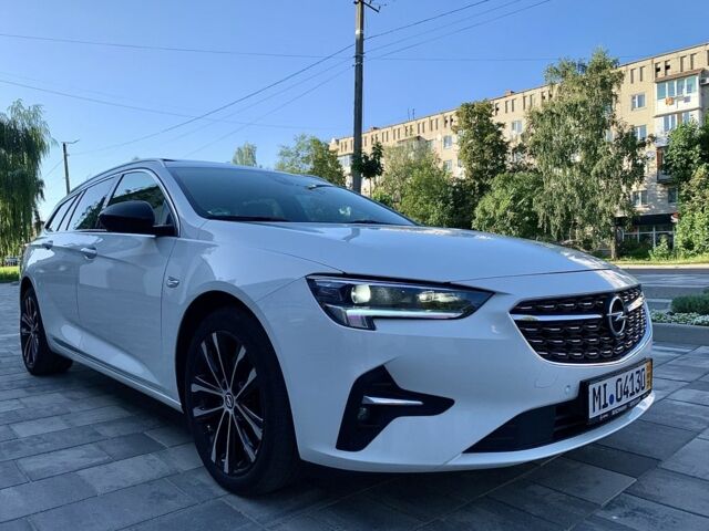 Белый Опель Инсигния, объемом двигателя 2 л и пробегом 189 тыс. км за 18600 $, фото 5 на Automoto.ua