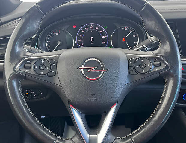 Белый Опель Инсигния, объемом двигателя 1.96 л и пробегом 145 тыс. км за 19750 $, фото 9 на Automoto.ua