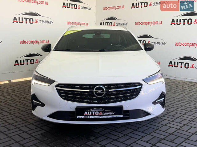Белый Опель Инсигния, объемом двигателя 1.96 л и пробегом 145 тыс. км за 19750 $, фото 1 на Automoto.ua
