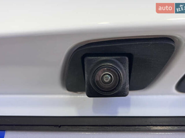 Білий Опель Інсігнія, об'ємом двигуна 1.96 л та пробігом 145 тис. км за 19750 $, фото 42 на Automoto.ua