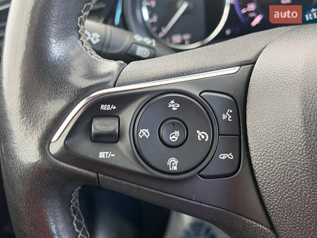 Білий Опель Інсігнія, об'ємом двигуна 1.96 л та пробігом 145 тис. км за 19750 $, фото 13 на Automoto.ua