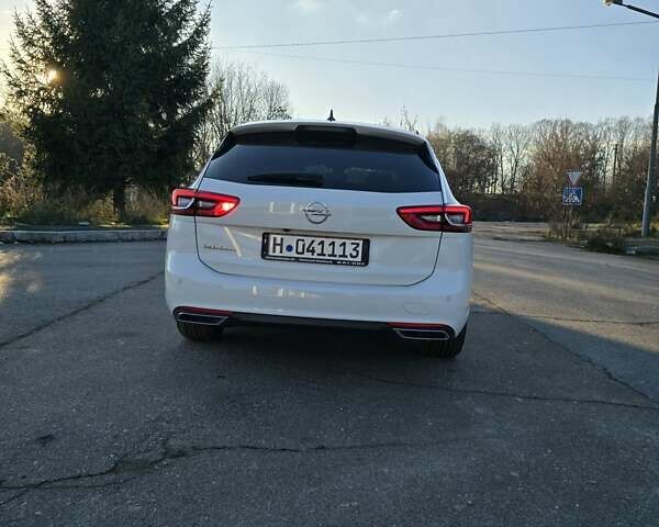 Белый Опель Инсигния, объемом двигателя 2 л и пробегом 153 тыс. км за 16800 $, фото 7 на Automoto.ua