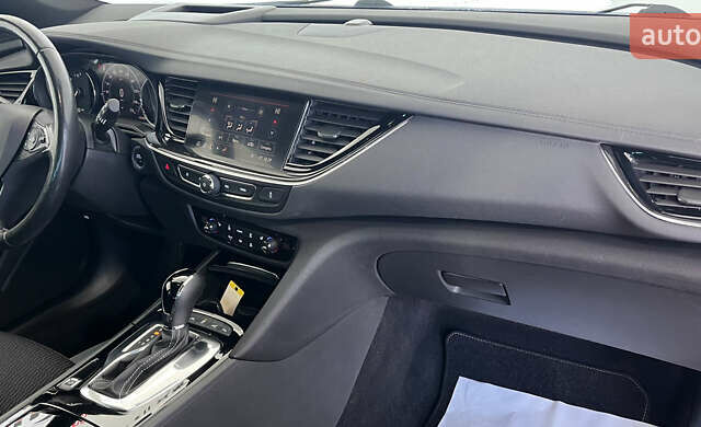 Білий Опель Інсігнія, об'ємом двигуна 1.96 л та пробігом 145 тис. км за 19750 $, фото 8 на Automoto.ua