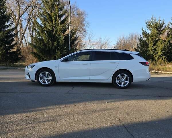 Белый Опель Инсигния, объемом двигателя 2 л и пробегом 153 тыс. км за 16800 $, фото 4 на Automoto.ua