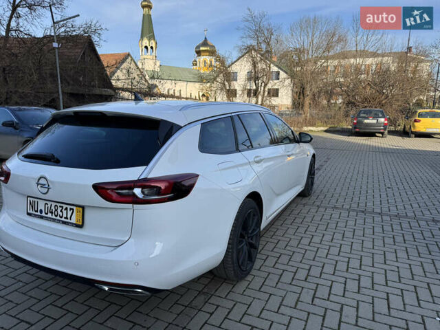 Белый Опель Инсигния, объемом двигателя 1.96 л и пробегом 189 тыс. км за 17700 $, фото 6 на Automoto.ua