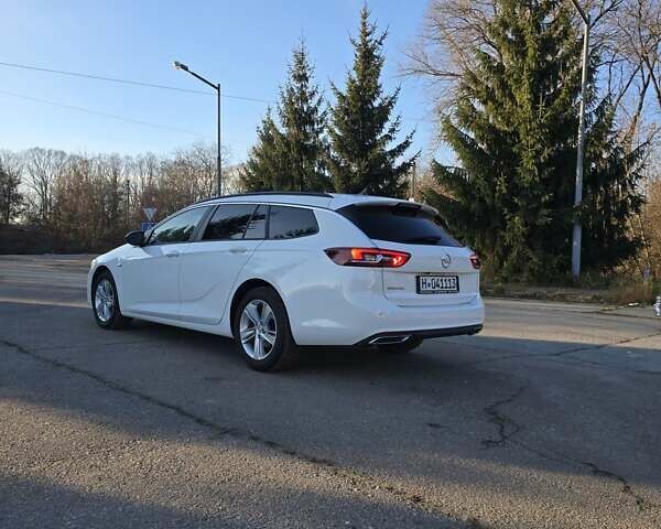 Белый Опель Инсигния, объемом двигателя 2 л и пробегом 153 тыс. км за 16800 $, фото 5 на Automoto.ua